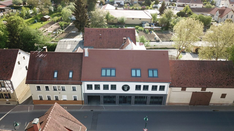 Neubau eines Friseursalons und einer Wohnung